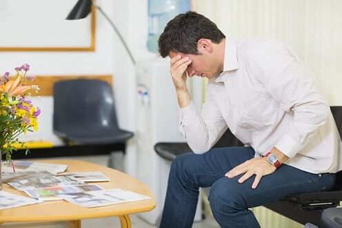 A man thinks about treating prostatitis with medicine